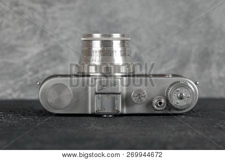 Moscow, Russia, February 06, 2018. The Old Film Camera Zarya, Brown Body, Released1961 On The Backgr