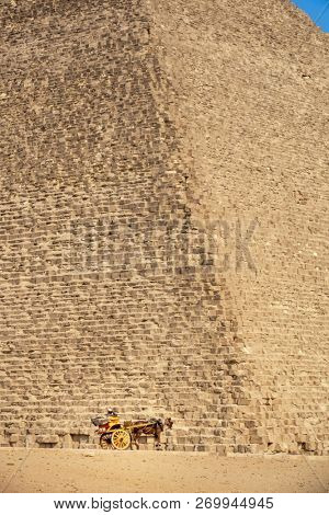 An image of a horse driver at the pyramids of Giza Cairo Egypt waiting for a tourist