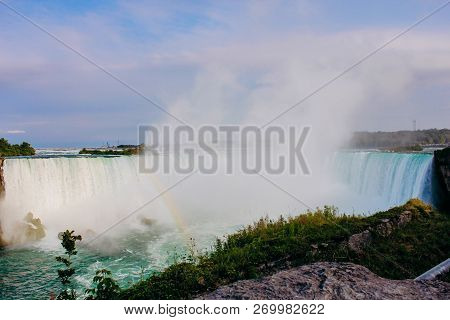 Inspiring View Of Niagara Falls With Rainbow