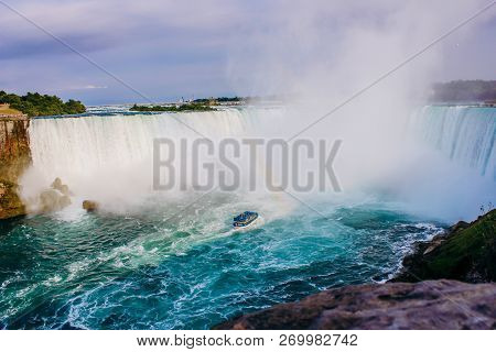 Inspiring View Of Niagara Falls With Rainbow