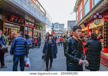 Beijing/china - 24 February 2017:unacquainted Chinese People Or Tourist Walking In Qianmen Street Th