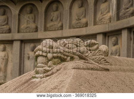 Haeinsa-gil, South Korea; May 26, 2020: Closeup Of Stone Dragon With Blurred Background Near Haeinsa