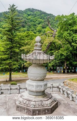 Haeinsa-gil, South Korea; May 26, 2020: Round Stone Pagoda On Concrete Near Entrance To Haeinsa Temp