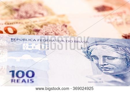 Brazilian Money, Macro And Close Up Of 100 And 50 Reais Bank Notes. Brazilian Economy Concept.