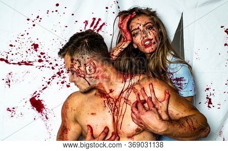 Full Of Blood. Muscular Man In Blood. Meatman In Butcher Shop. Butchery. Bloody Halloween Couple In 
