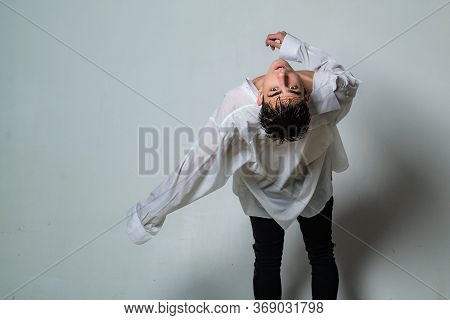 Sence Of Freedom. Undressing. Stylish Man With Bare Chest Wear Shirt. Male Fashion And Trend. Macho 