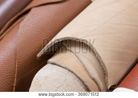 Close Up Osf Cutted Piece Of Leather In Roll.