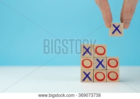 Business Marketing Strategy Planning Concept. Wooden Block Tic Tac Toe Board Game