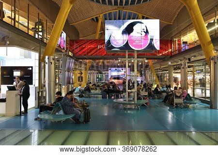 Madrid, Spain - December 6, 2016: People Wait At Terminal T4 Madrid Barajas Airport In Spain. It Is 
