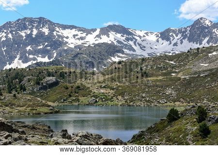 Beautiful View Hiking In The Andorra Pyrenees Mountains In Ordino, Near The Lakes Of Tristaina.