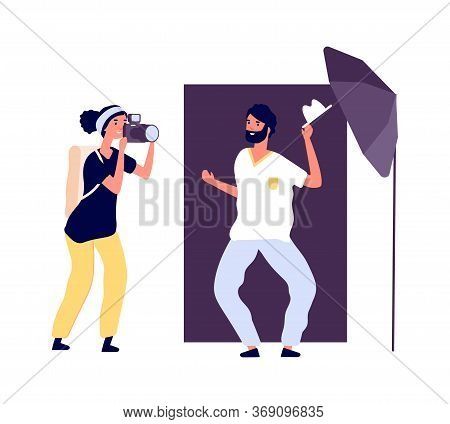 Photo Studio. Actor Posing Photographer. Professional Photo Session For Portfolio With Equipment And