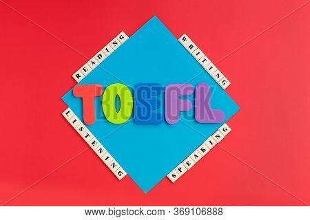 Word Toefl And Words Reading, Listening, Writing, Speaking On Color Background. Usa Exam. Speaking E