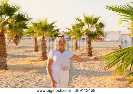 Portrait Of Smiling Happy Senior Woman On Resort. Greece. Crete. Rethumno.