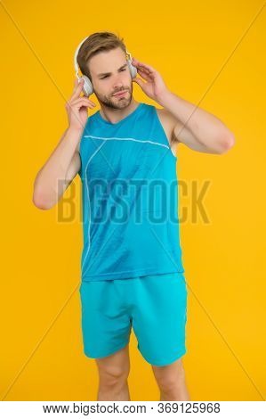 Everyone Needs A Tune-up. Sportsman Listen To Music. Sportsman Training To Tune. Strong Sportsman We