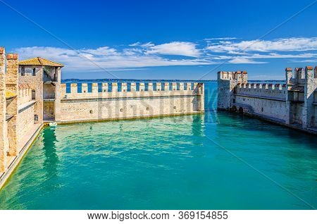 Small Fortified Harbor With Turquoise Water, Scaligero Castle Castello Di Sirmione Fortress, Sirmion