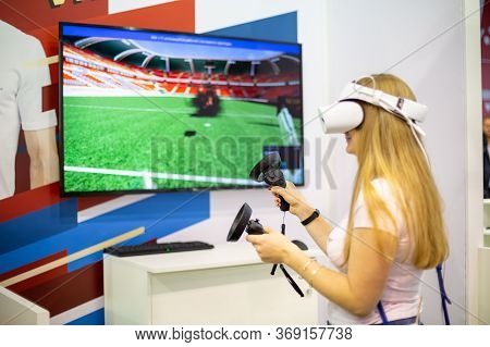 Moscow, Russia - October 04, 2019: Young Caucasian Girl In Dell Visor Windows Mixed Reality Headset 