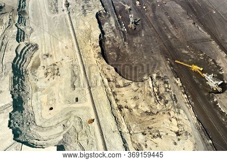 Aerial View Of Coal Mining With Bucket Wheel Excavator. Top View Of A Quarry. Heavy Mining Industry
