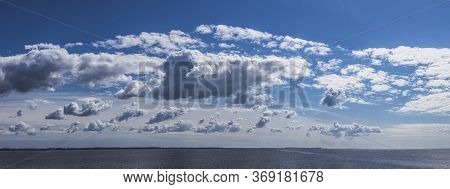 Panoramic View Beautiful  Cloudy Blue Sky Over Big River. Europe, Ukraine, Kremenchuk Reservoir, Dni