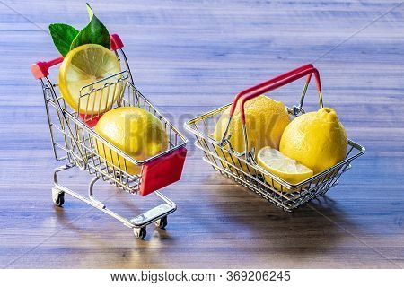 Supermarket Cart Carrying Green Leaf And Lemon
