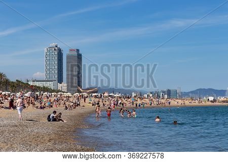 Barcelona, Spain - May 15, 2017: Unknown People Resting And Sunbathing On A City Beach In Barcelona 