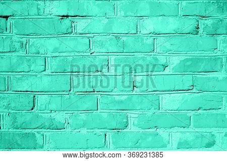 Brick Wall Texture. Vivid Biscay Green Color Background With Copy Space For Design. Tones Of Biscay 