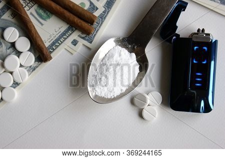 Drugs, Cigars And Money On A White Background. Addiction Concept