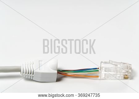 Assembly Of The Internet Cable Cat6. Installation Of Terminals Rj45 On The Internet Cable. High-spee