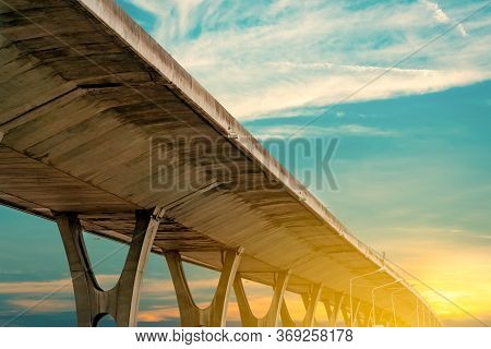 Bottom View Of Elevated Concrete Highway. Overpass Concrete Road. Road Flyover Structure. Modern Mot