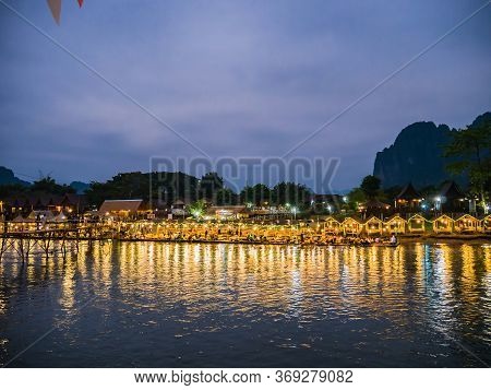 Vangvieng/lao-9 Dec 2017:beautiful View Of Nam Song River With Riverside Restaurant And The Mountain
