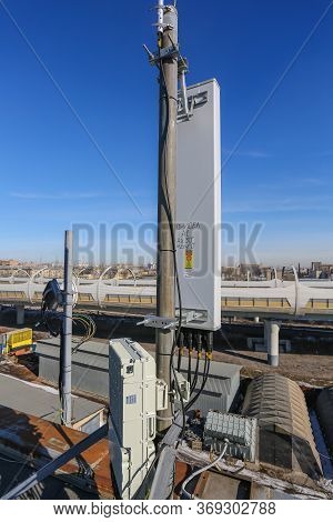 Russia, Saint-petersburg - April 30, 2018: Panel Antenna Of 5g, 4g, 3g, 2g Bands, Optical Fibers, Po