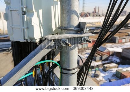 Russia, Saint-petersburg - April 30, 2018: Mounting Of Outdoor Remote Radio Unit Rru And Cables Of B