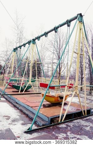 Old Abandoned Amusement Park In Winter Time