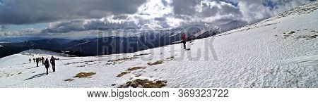 Iezer Mountains, Romania -  February 28, 2020: Hiking In The Mountains  During Winter - Panoramic Vi