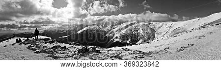 Iezer Mountains, Romania -  February 28, 2020: Hiking In The Mountains  During Winter