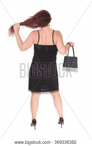 A Beautiful Woman Standing In A Black Dress From The Back With Her Long
Red Hair, Isolated For White