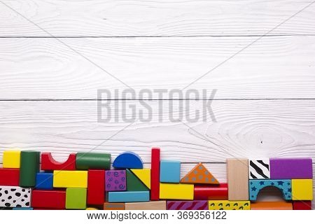 Kids Educational Developing Toys Frame On White Background. Top View. Flat Lay. Copy Space For Text