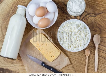 Village Products On The Board: Milk, Cottage Cheese, Eggs, Sour Cream And Cheese. Healthy Food, A So
