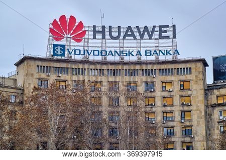 Belgrade / Serbia - December 21, 2019: Huge Huawei Logo On The Top Of The Dom Sindikata (kombank Dvo