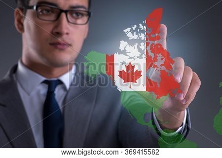 Concept of immigration to Canada with virtual button pressing