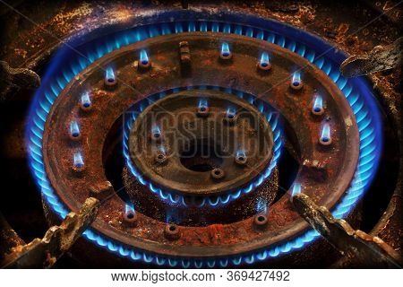 Blue Flames Of Gas Burning From A Kitchen Gas Stove
