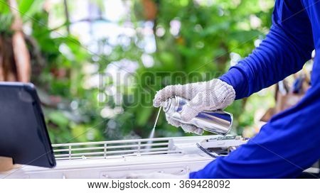 Asian Man Online Learning And Repair Air Conditioner At Home. New Normal Life After Covid-19. Lock D