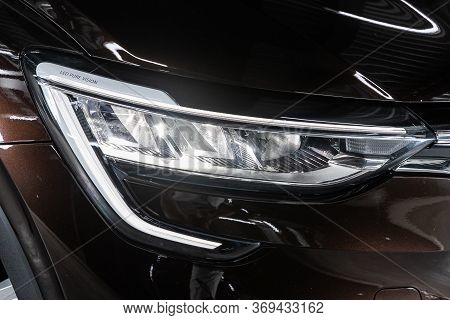 Novosibirsk/ Russia - May 25, 2020: Renault Arkana, Glowing Headlight Of A Modern Car Close-up
