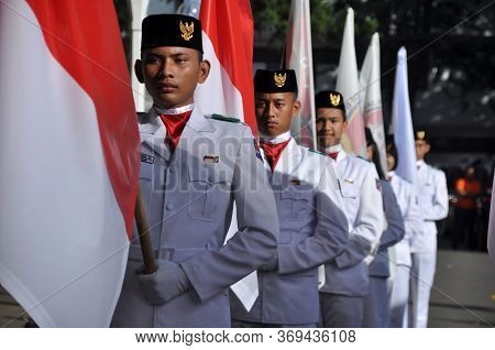 Bogor, Indonesia - June 02, 2012: Indonesian Male Flag Raisers During The Ceremony