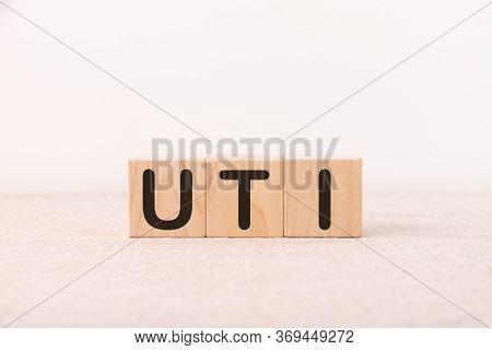 Uti - Acronym From Wooden Blocks With Letters, Abbreviation Uti Urinary Tract Infection.