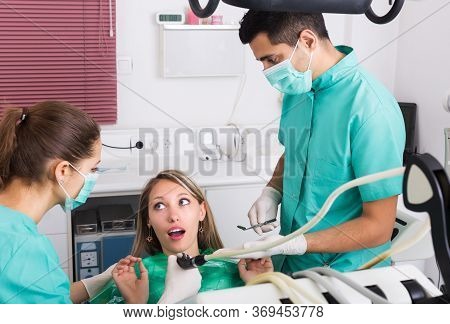 Terrified Girl Client And Dental Clinic Crew During Check Up