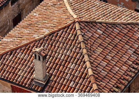 Pantiles. Closeup Of An Old House Roof With Tiles Made From Clay (coppo In Italian Language), Seen F