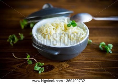 Sweet Boiled Vermicelli With Milk In A Ceramic Bowl