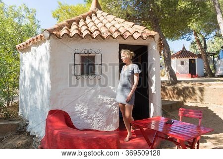 Woman On Summer Vacation In Front Of Unique Vintage Traditional Mobile Home House At Camping Site, R