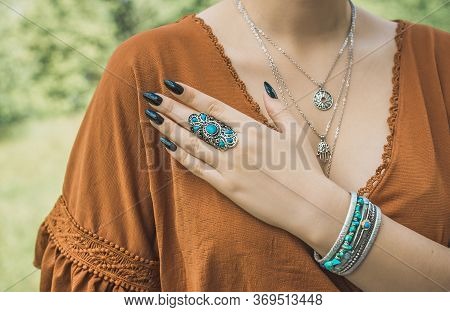Boho silver rings and other accessorize. Women's Bohemian fashionable details