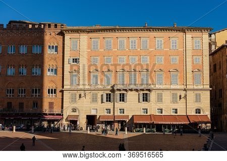 Siena, Tuscany, Italy - Jan 5, 2017: Ancient Palaces (palazzo Sansedoni And Chigi Zondadari) In Piaz